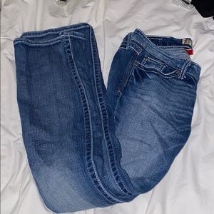 buckle low rise flare jeans